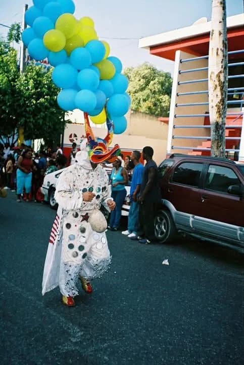 ACM members carrying the association banner through a community parade